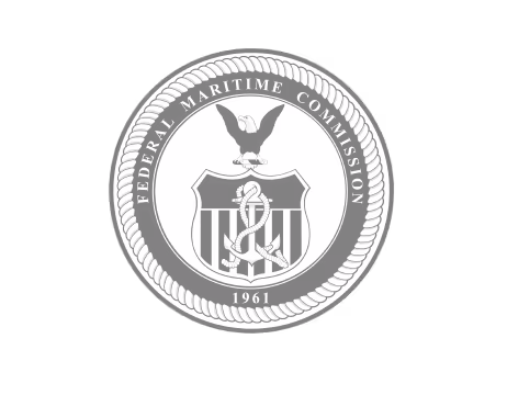 Seal of the Federal Maritime Commission featuring an eagle above a shield with an anchor and rope, encircled by rope with text 'Federal Maritime Commission' and '1961'.